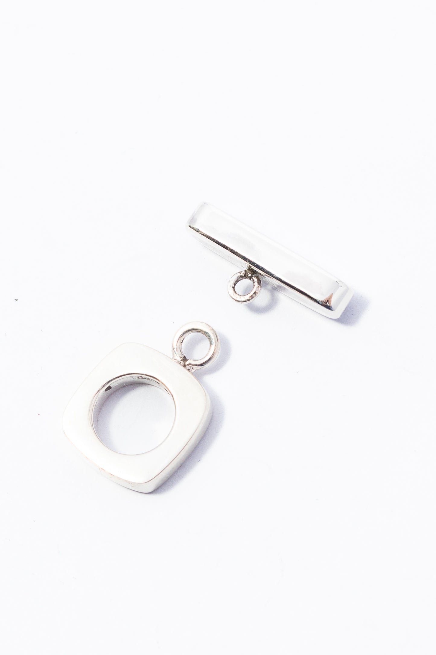 Broche de Plata Cartoneado