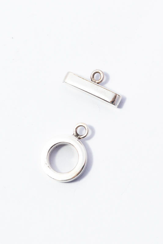Broche de Plata Cartoneado