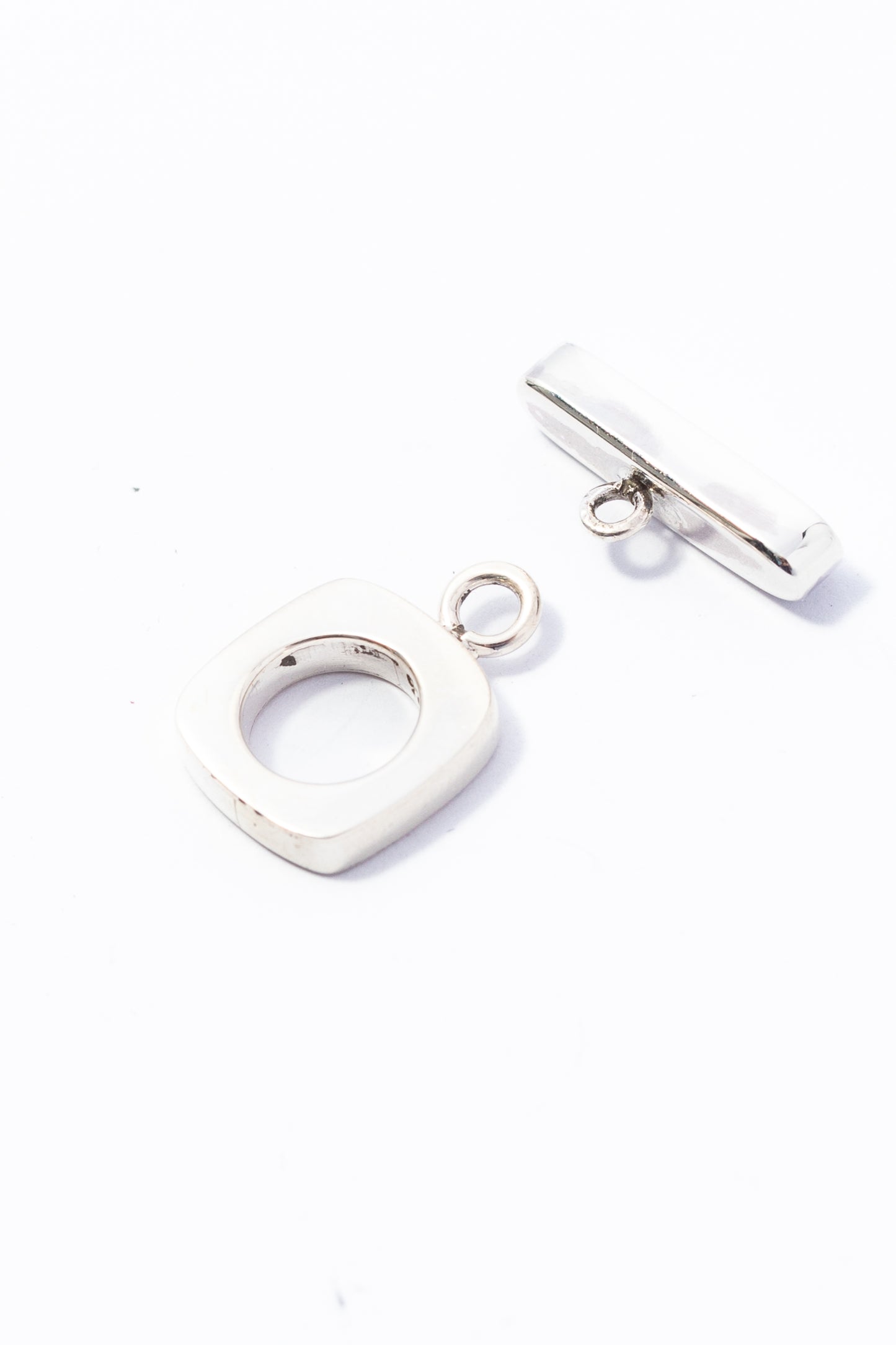 Broche de Plata Cartoneado