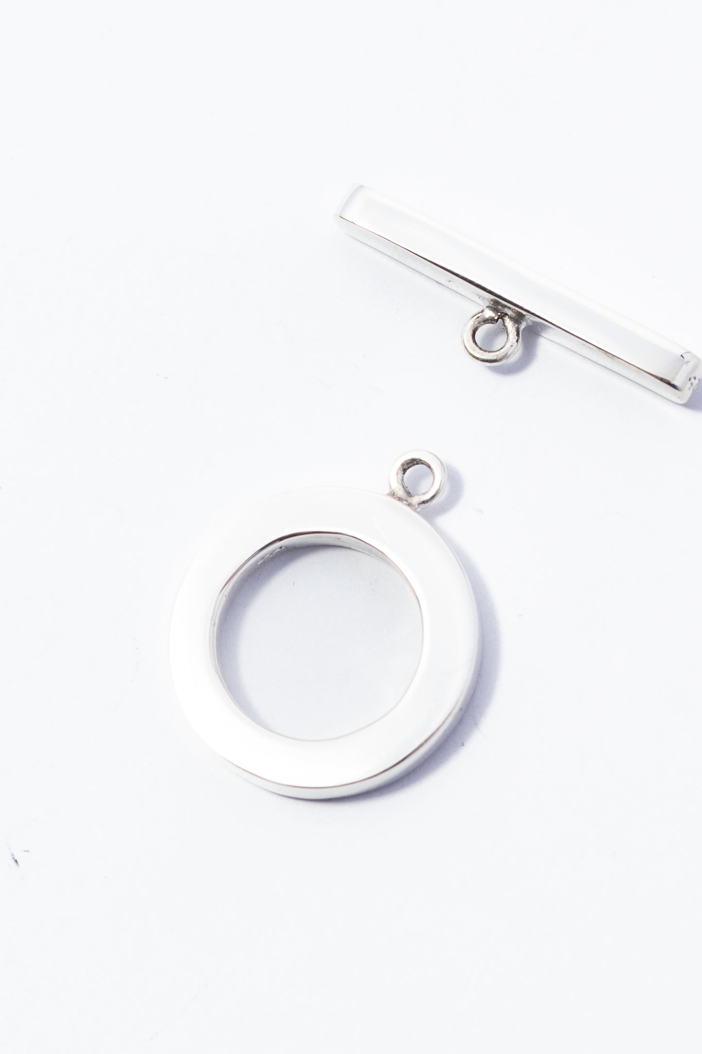 Broche de Plata Cartoneado