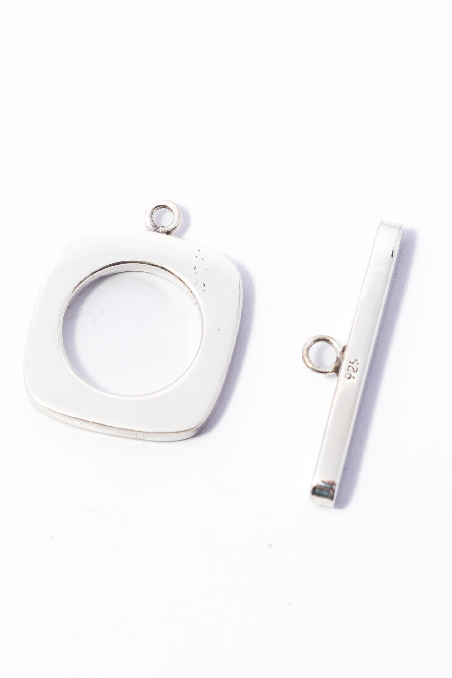 Broche de Plata Cartoneado