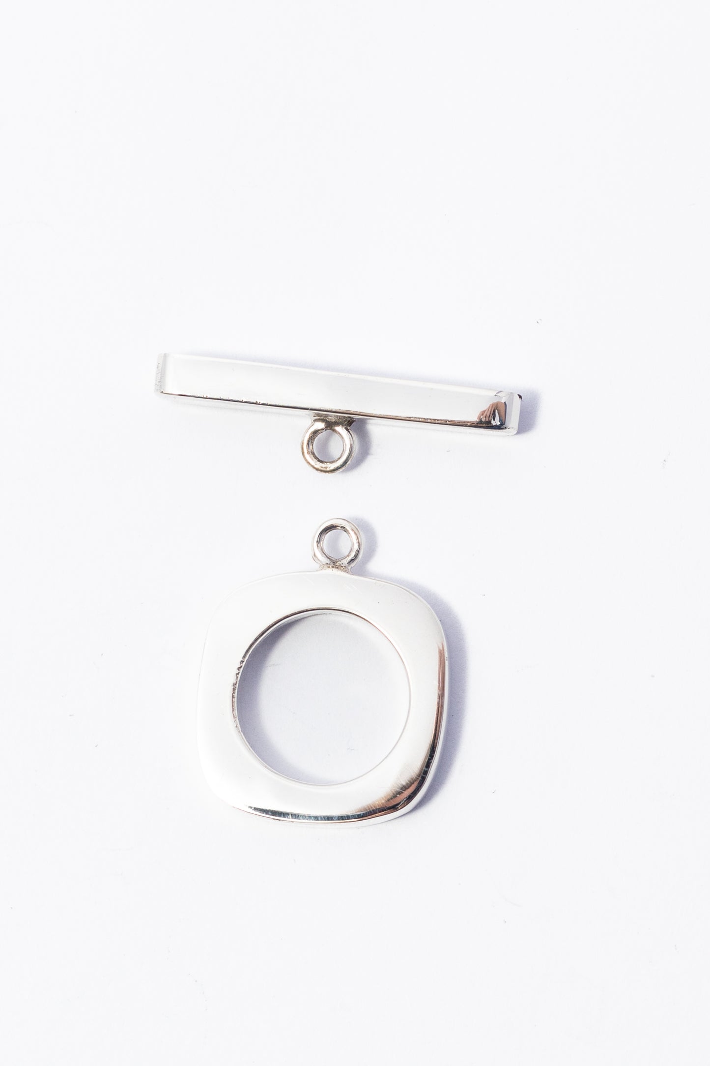 Broche de Plata Cartoneado