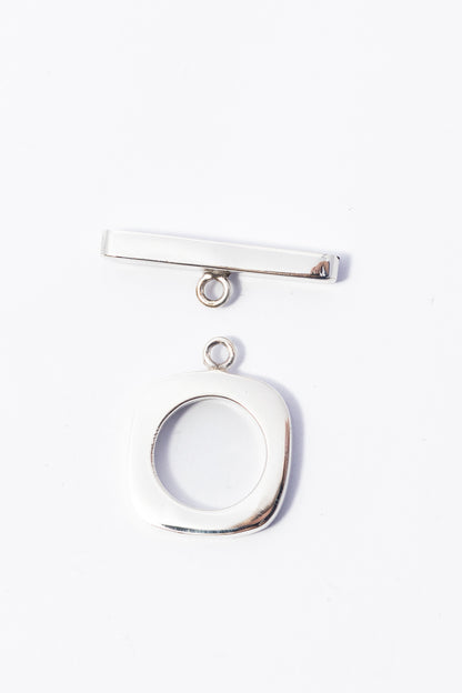 Broche de Plata Cartoneado