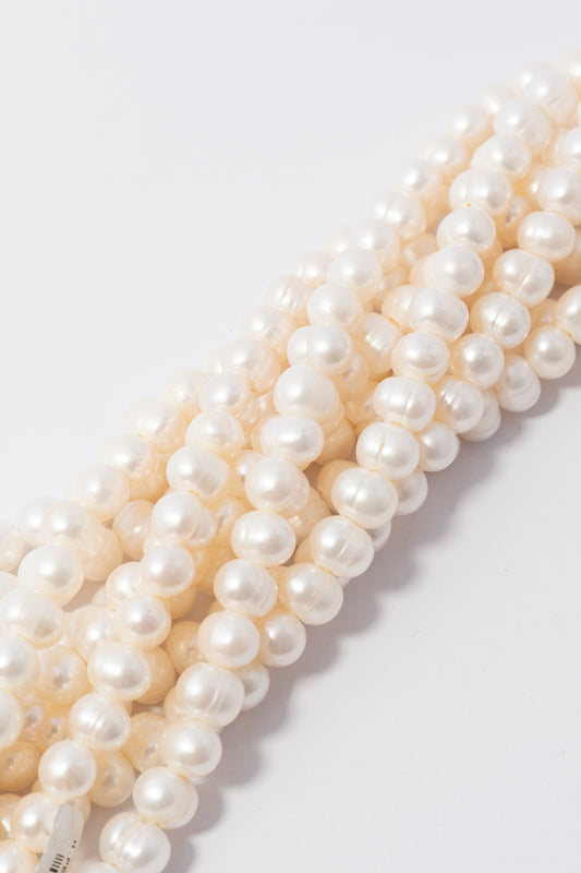 Hilo de Perla Oval Perforación Grande