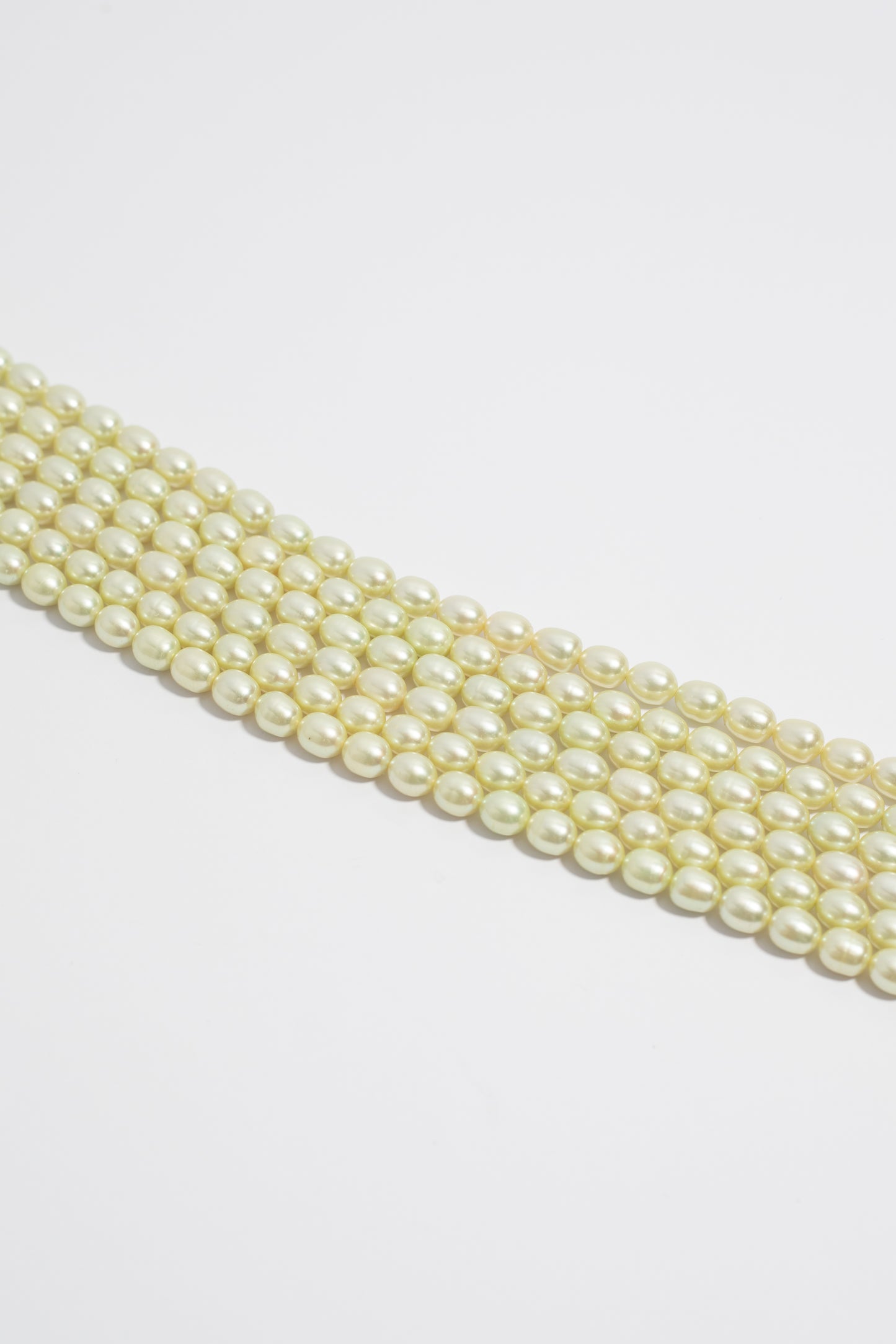 Hilo de Perla Oval Verde